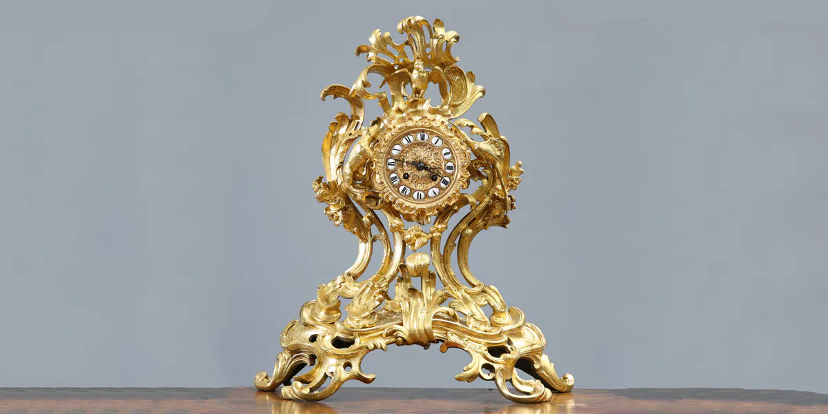 Large French gilt mantelpiece glock. Photo © Elstob & Elstob