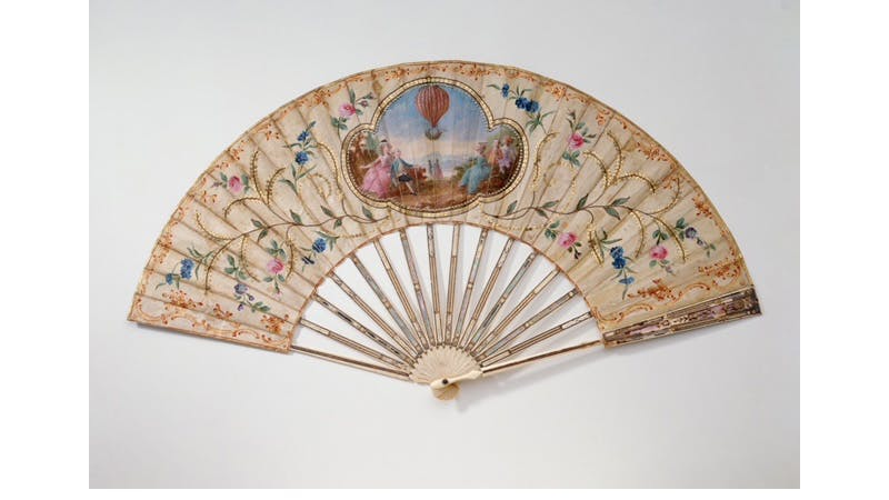 French folding fan for the first balloon ascent by the Montgolfier brothers on 5 June 1783, ivory, partially gilded, silk. Photo © German Fan Museum Barisch Foundation
