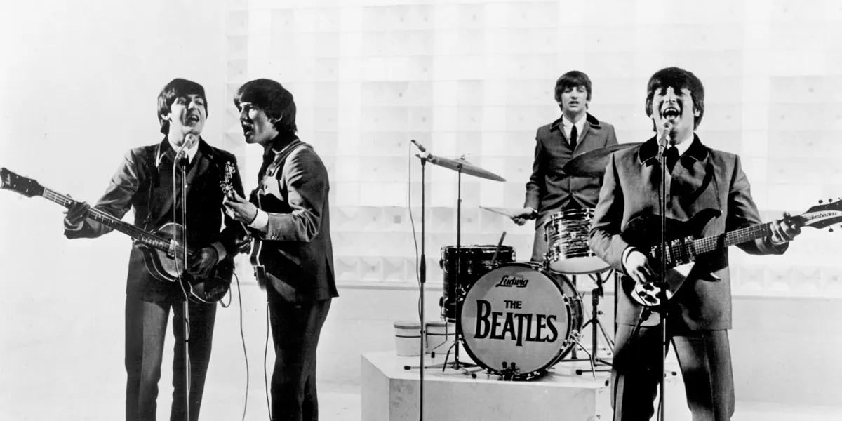The Beatles performing on a TV show in 1963. Photo by Michael Ochs Archives via Getty Images
