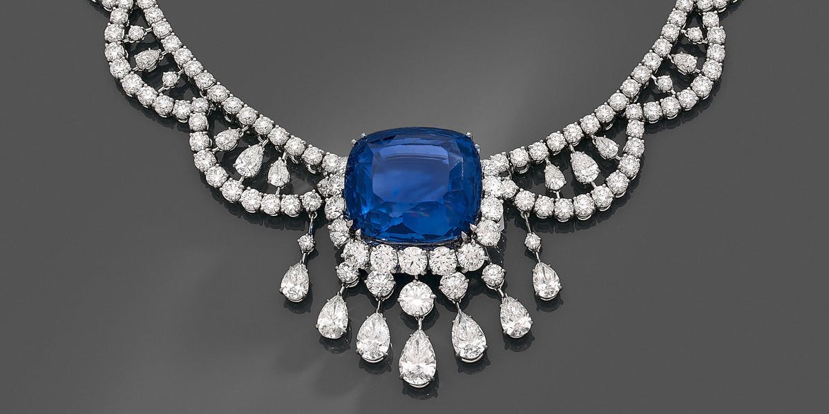 Spectacular necklace in platinum and diamond drapery, centered at the neckline of an exceptional cushion-cut sapphire weighing 98.71 cts, image © HVMC
