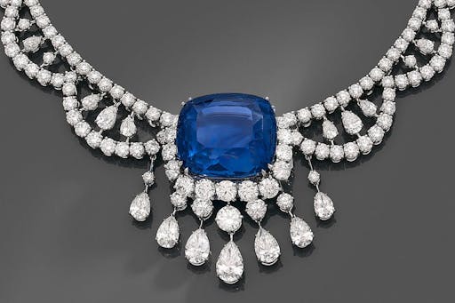 Spectacular necklace in platinum and diamond drapery, centered at the neckline of an exceptional cushion-cut sapphire weighing 98.71 cts, image © HVMC