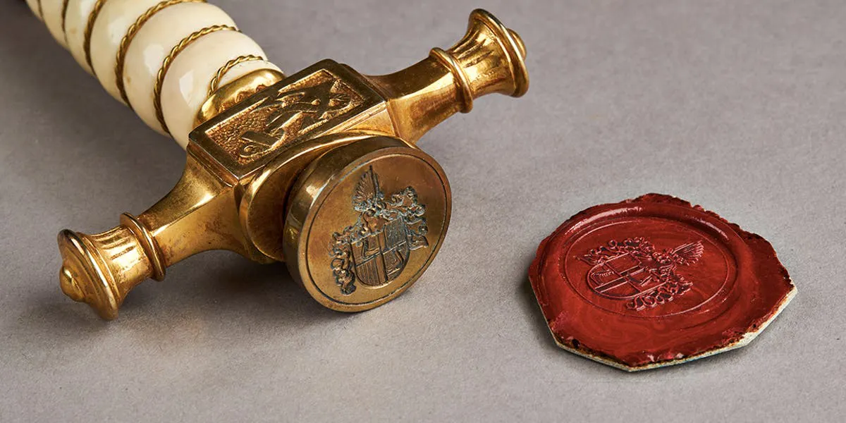 Desk set of Grand Admiral Alfred v. Tirpitz (1849 - 1930), letter opener and seal with family coat of arms. Image © AH Andreas Thies