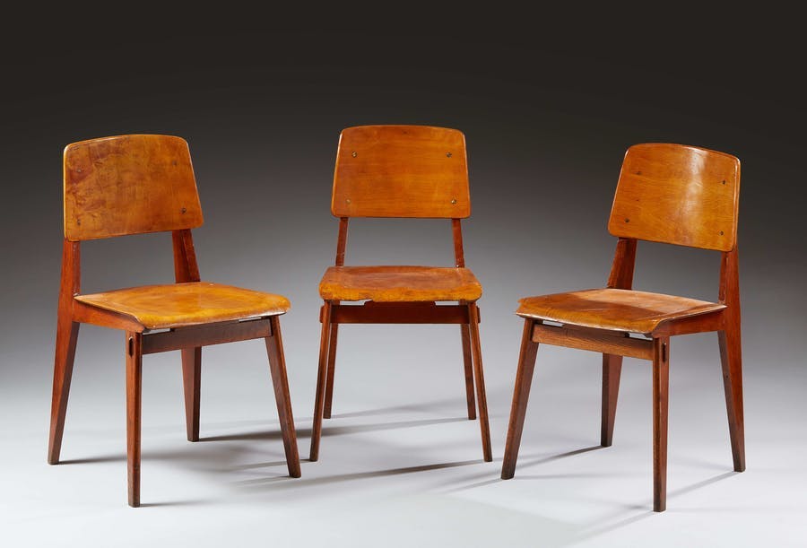Jean Prouvé, three "Tout Bois" model chairs in solid beech and molded plywood. “Les Ateliers Jean Prouvé édition”, circa 1942. Photo © Rossini
