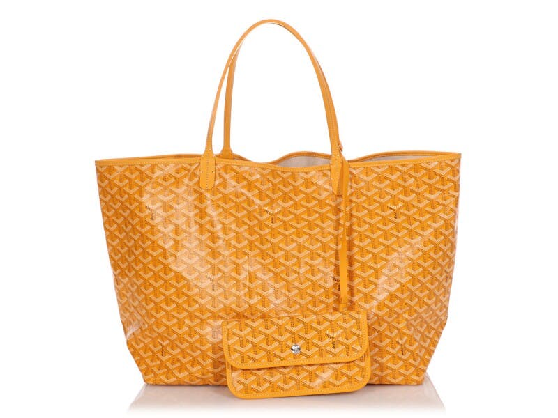 Maison Goyard - *A few examples of the 22 variations allowed by the Rouette  (1/3): Elegant sobriety with the leather flap inside the bag, side gussets  tucked in and short strap. *Quelques