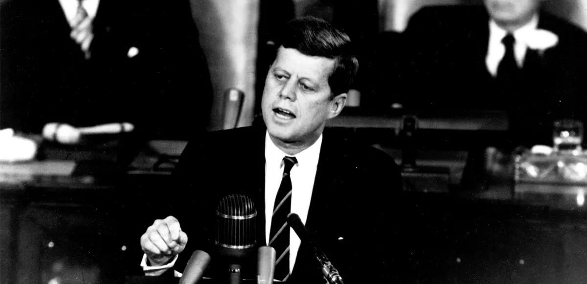 Kennedy proposing a program to Congress that will land men on the Moon, May 1961. Johnson and Sam Rayburn are seated behind him. Image: NASA