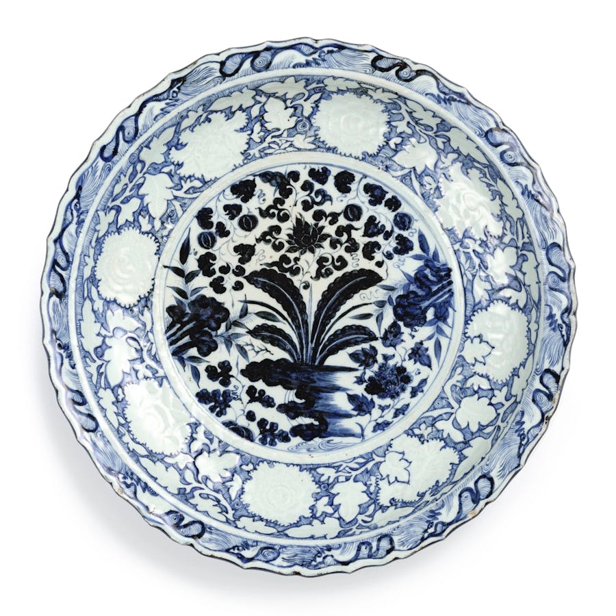 A rare and important blue and white barbed ‘Banana Plant and Peony’ Charger, Yuan Dynasty. Image © Sotheby’s Hong Kong. 