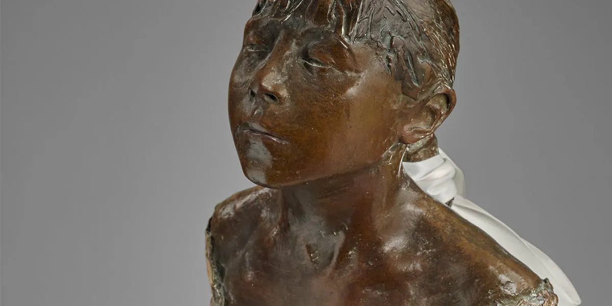 Edgar Degas (1834-1917) Petite danseuse de quatorze ans, 1927 print, bronze with brown patina with chiffon skirt and satin hair ribbon on wooden base, height 102.9 cm. Photo © Christie's (detail)
