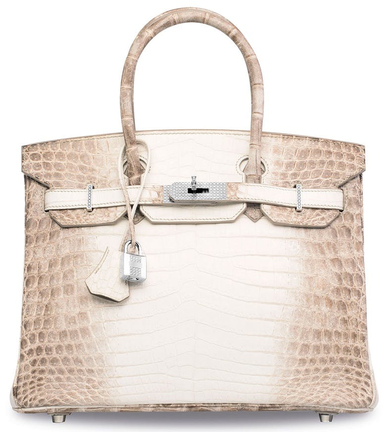 An exceptional matte white Himalaya Niloticus Crocodile Diamond Birkin 30 with 18K white gold & diamond hardware, Hermès, 2014. 30 x 22 x 15 cm. Sold for HK$3,000,000 on 27 November 2020 at Christie’s in Hong Kong. Image © Christie's