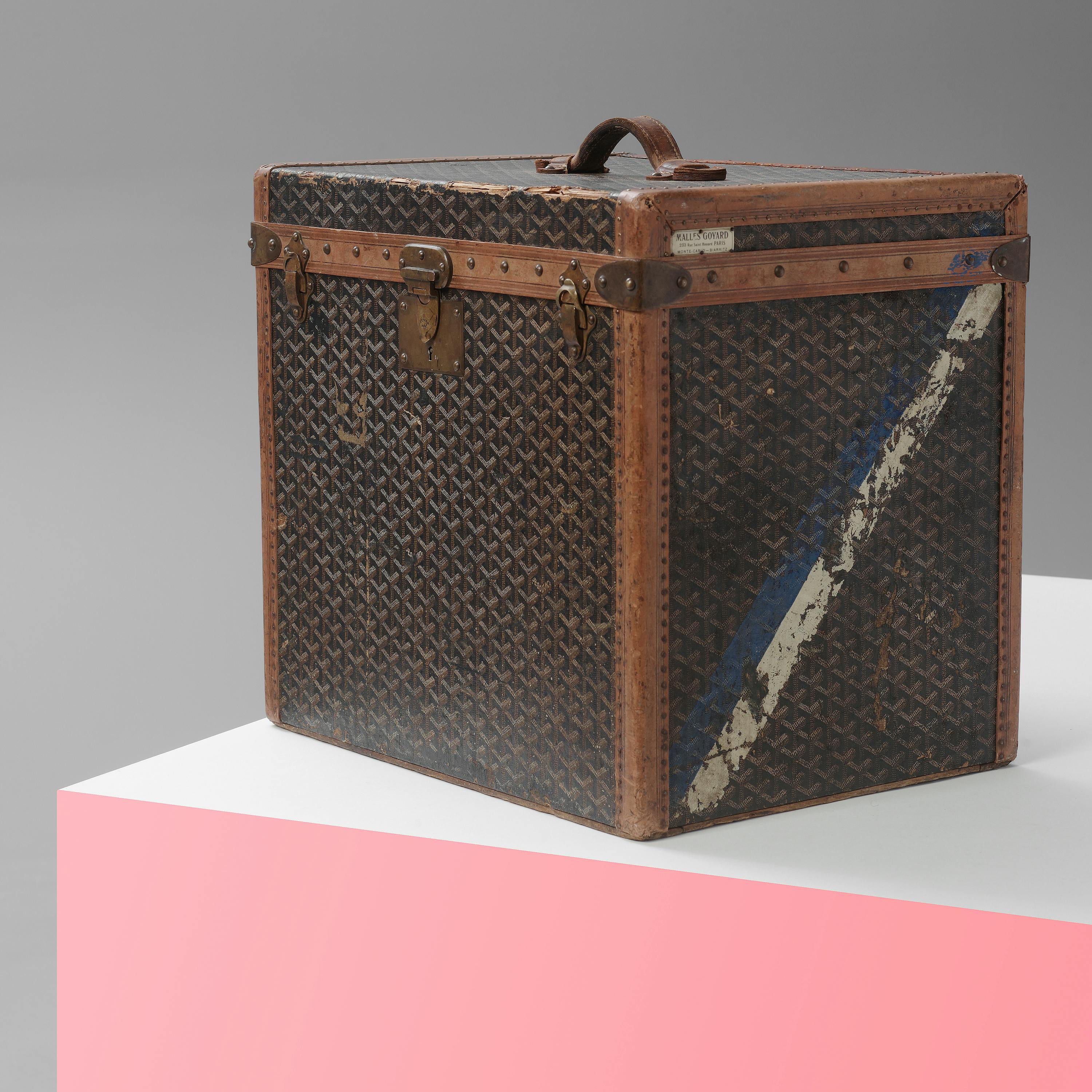 A vintage Louis Vuitton Trunk has been repurposed into a room for