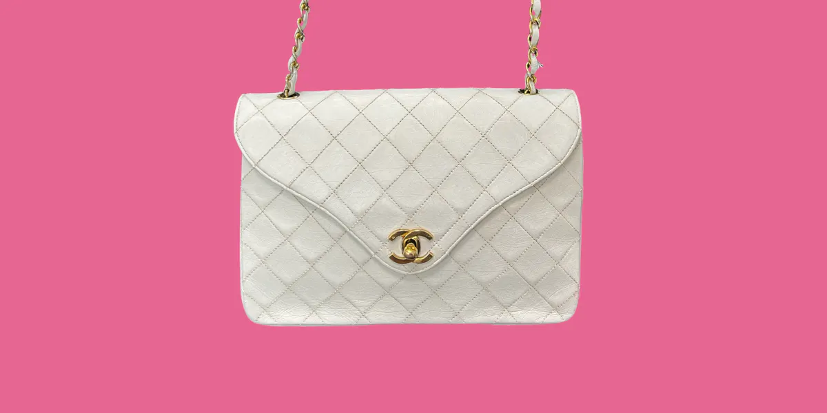 Classic quilted 1980s white Chanel handbag. Photo © Ewbank's