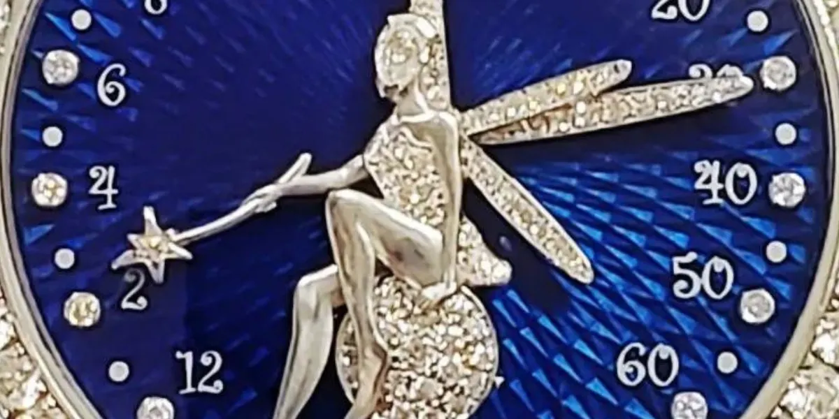 Rare Van Cleef & Arpels Fairy Diamond Encrusted Retrograde 18k White Gold Poetic Collection Limited Edition Watch. Image © Hess Fine Auctions (detail)