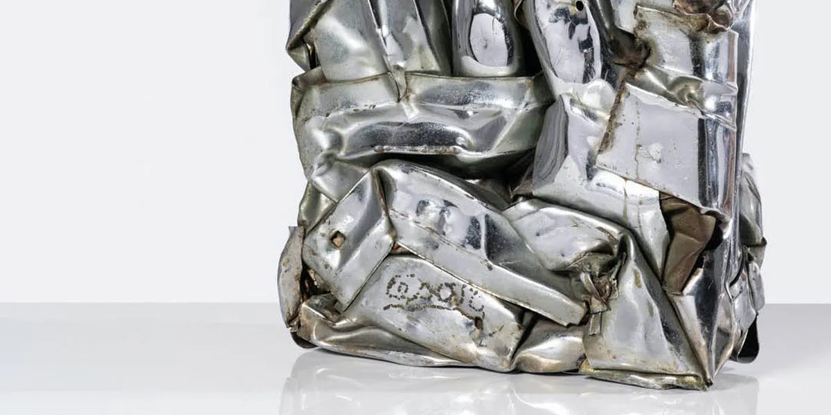 César, ‘Compression’ [detail], compressed metal, signed lower left. Photo © PIASA