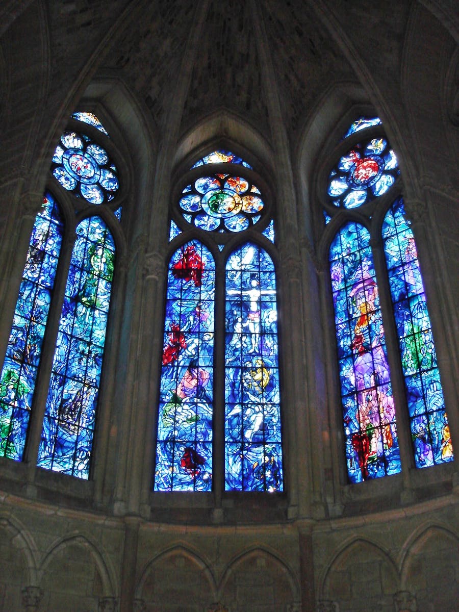 Stained glass windows in the axial chapel of Reims Cathedral designed by Marc Chagall and made by Charles Marq in 1974. Image: Peter Lucas