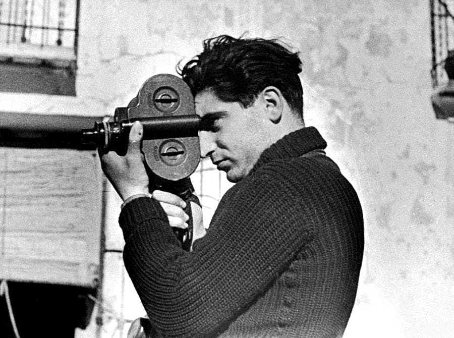 Robert Capa in Spain during the Civil War, 1936. Photo by Gerda Taro, in the public domain.