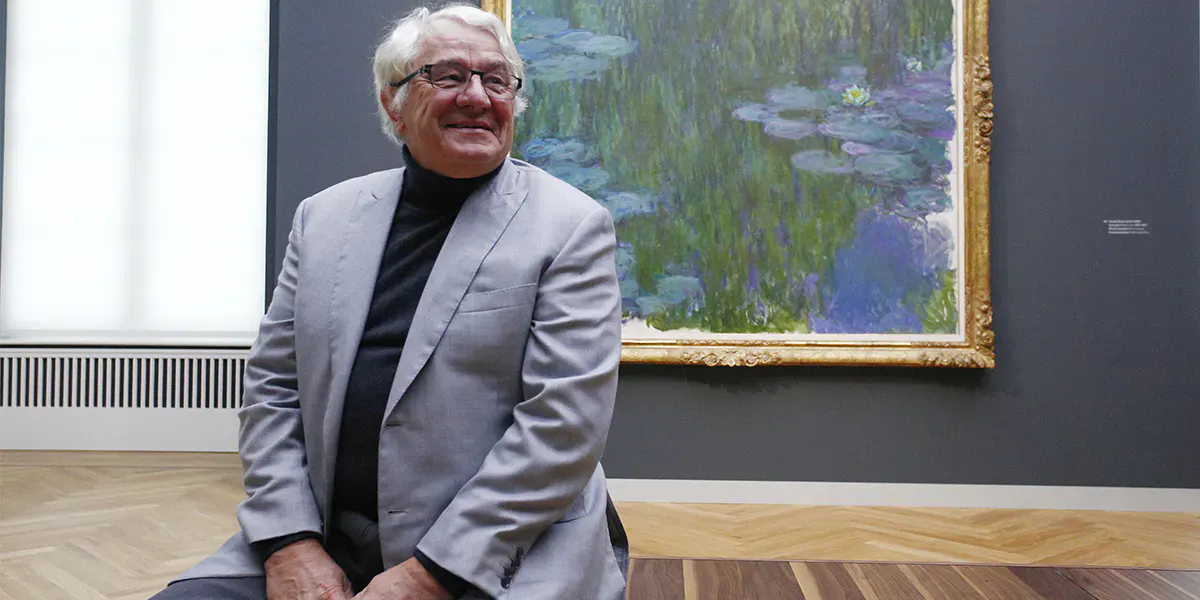 POTSDAM, GERMANY - JANUARY 19: Hasso Plattner, co-founder of German software maker SAP and financier of the Barberini Museum, poses in front of French impressionist Monet's painting titled Water Lilies during a press preview on January 19, 2017 in Potsdam, Germany. The art museum will house a permanent collection from Plattner's foundation, focusing on 20th-century German art, from both West and East Germany. The museum opens to the public on January 23 with an exhibition on Impressionist landscapes. (Photo by Michele Tantussi/Getty Images) (detail)