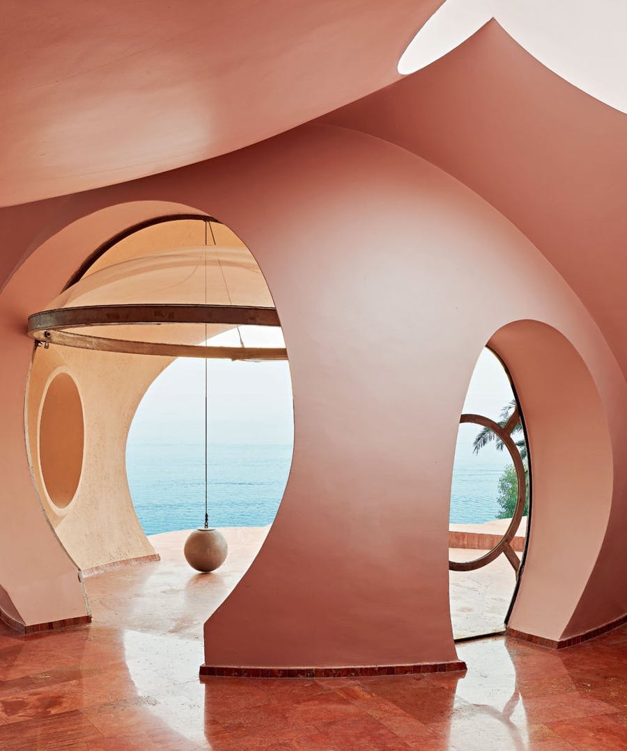Spherical interiors with large porthole-type windows, Christie's Real Estate International / Michaël Zingraf Real Estate via Luxury Defined