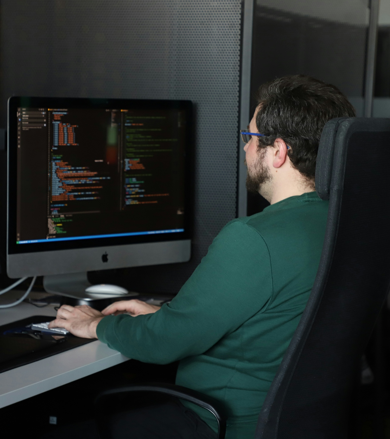 A man working at his computer