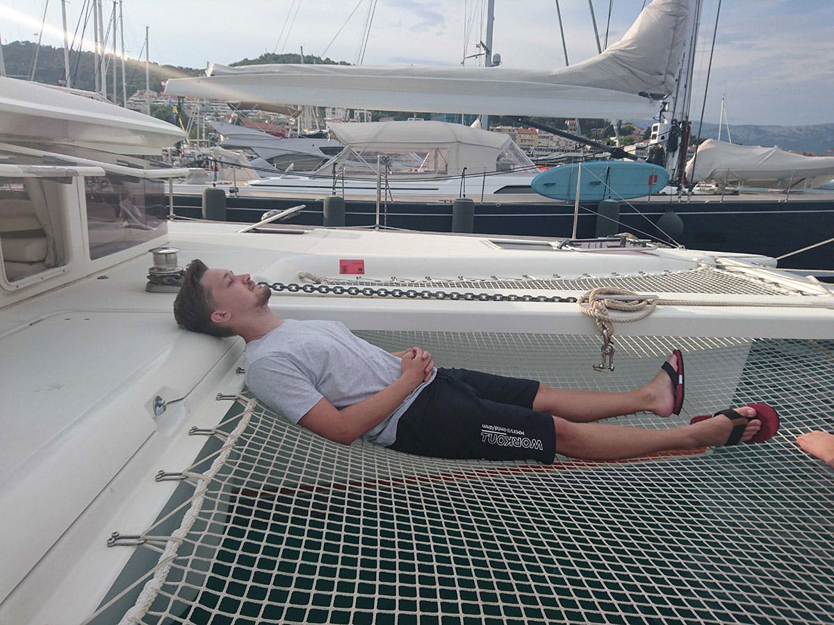 Dominik relaxing on the multihull net