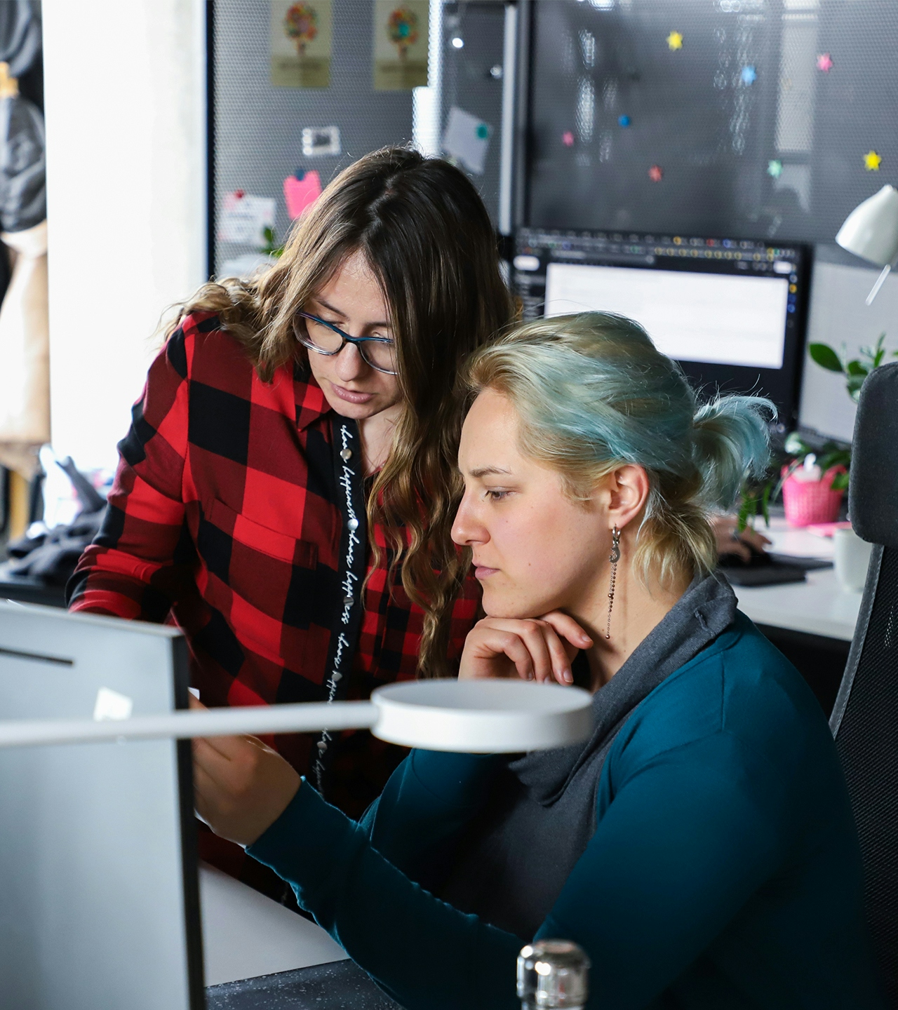 Coworkers discussing something Coworkers discussing something