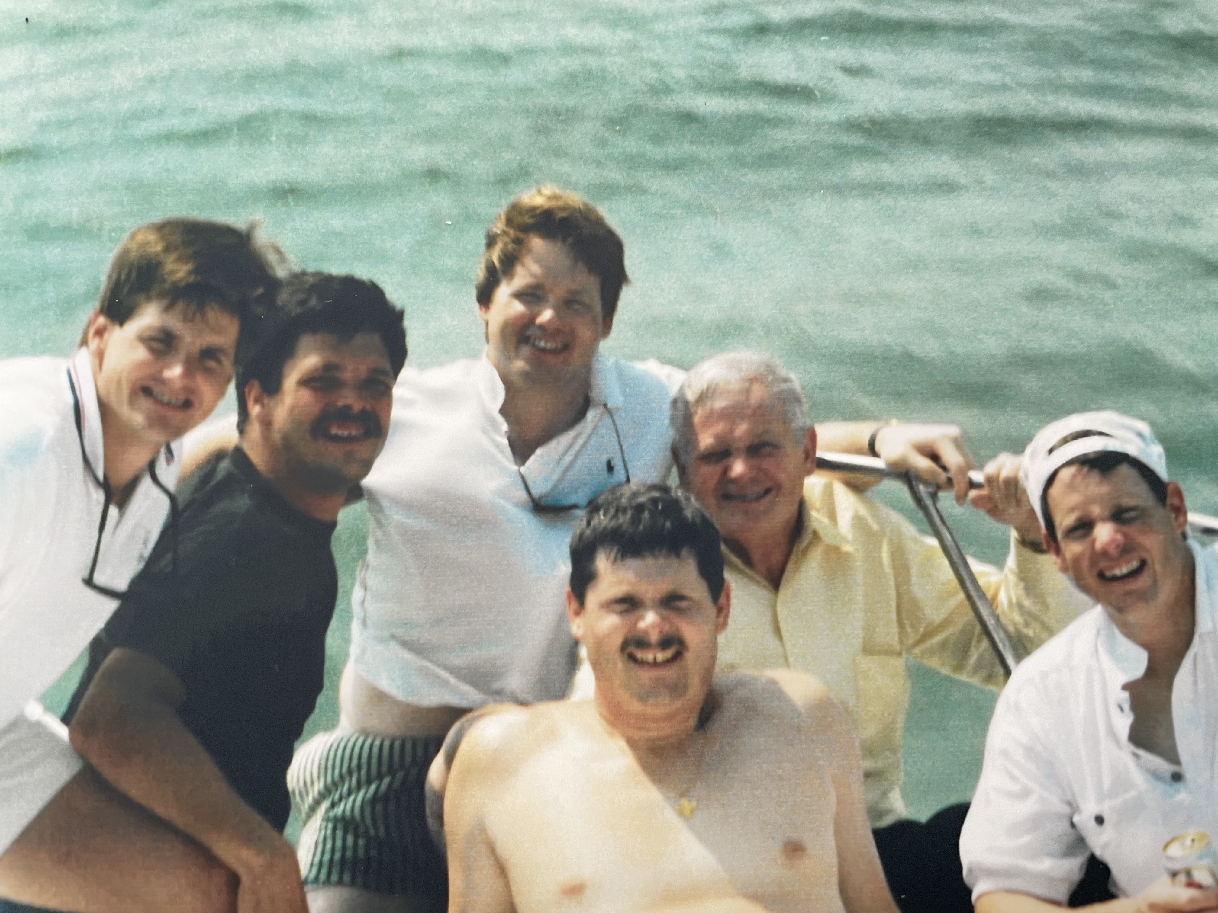 Our Pop with his 5 boys on a fishing trip!