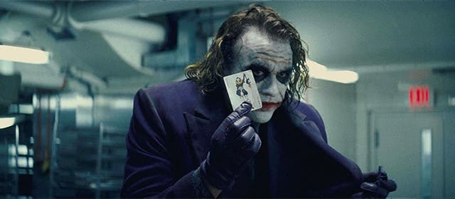 Le personne du Joker interprété par Heath Ledget