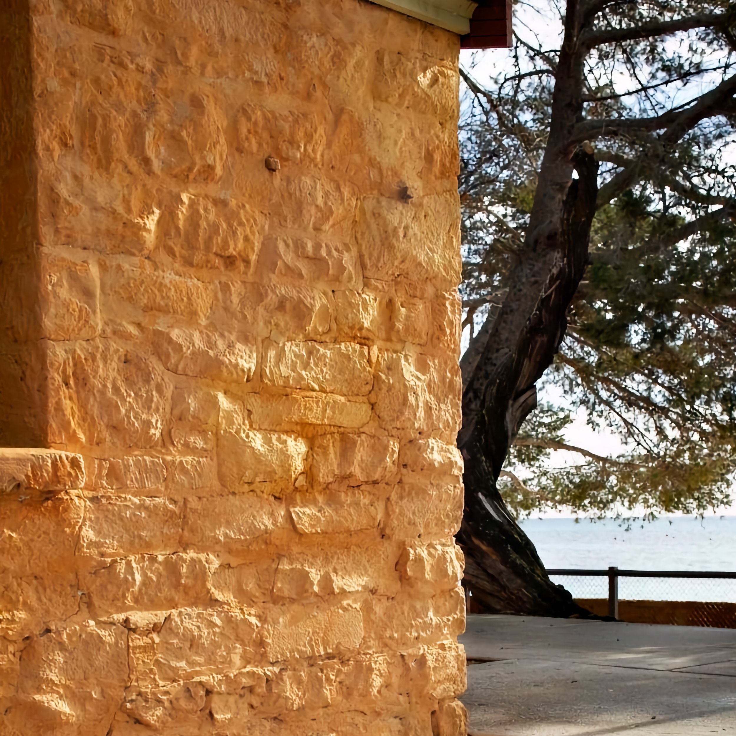 How to paint limewash on stone walls