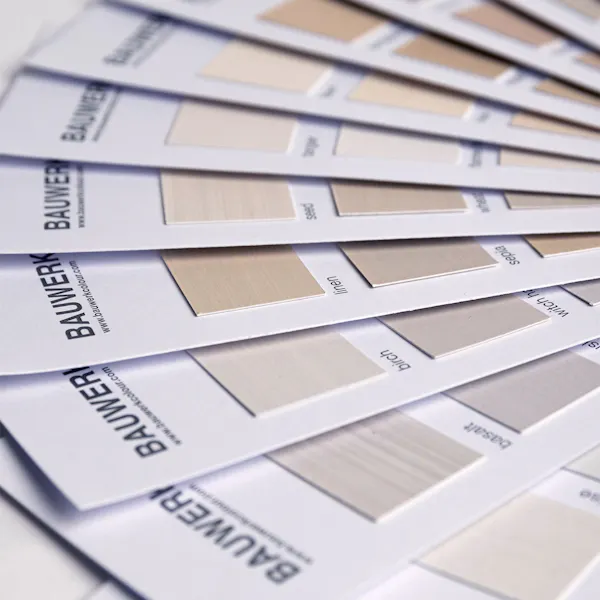 Limewash paint sample fan deck spread out to show neutral swatches