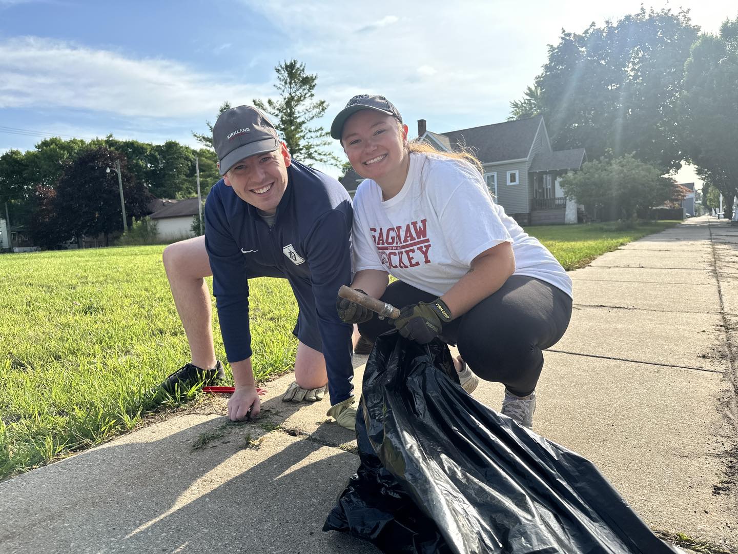 Picking up trash and pulling weeds in Bay City
