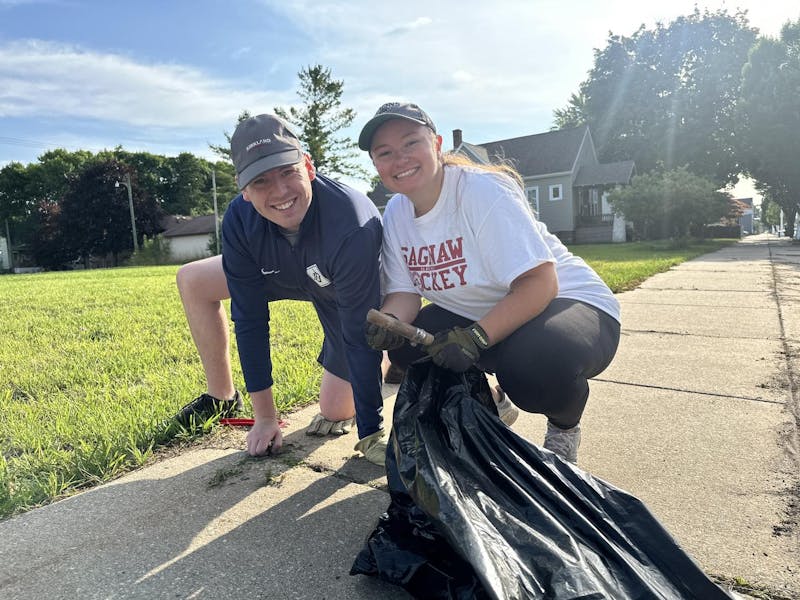 Picking up trash and pulling weeds in Bay City