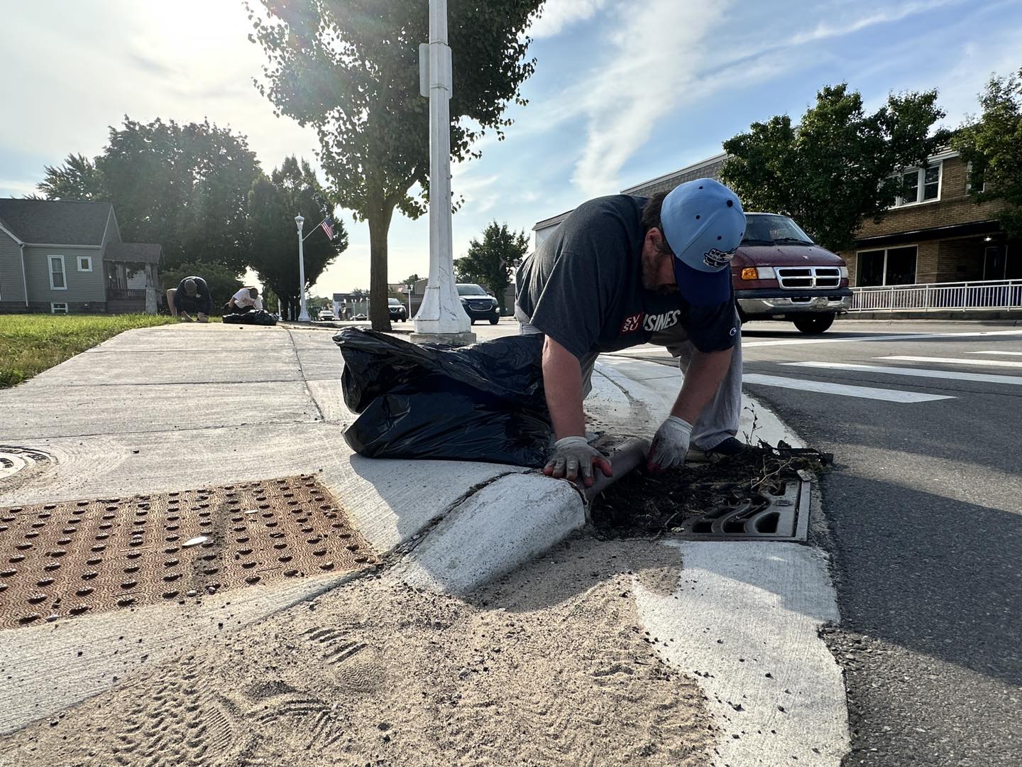 Picking up trash and pulling weeds in Bay City