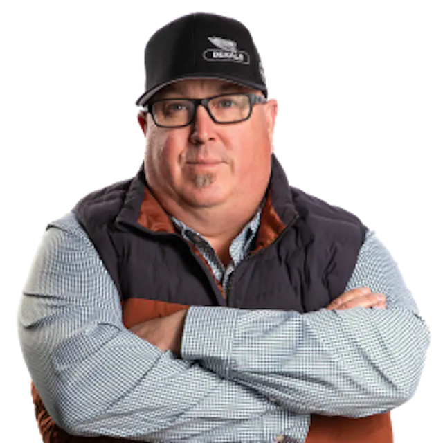 Photo of Ed Schafer with his arms crossed