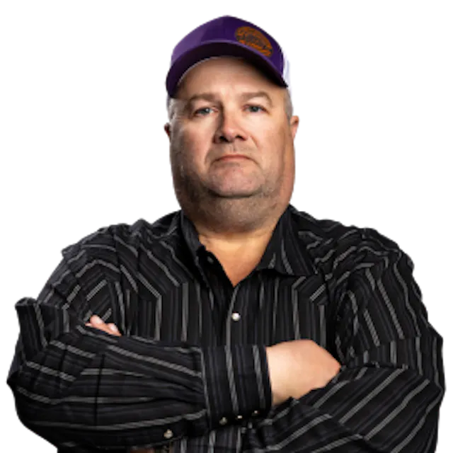 Photo of Craig Crone with his arms crossed