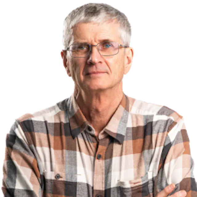 Photo of Bryan Gillies with his arms crossed