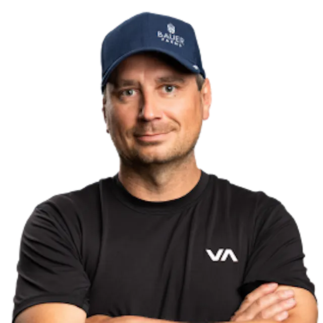 Photo of Chris Bauer with his arms crossed