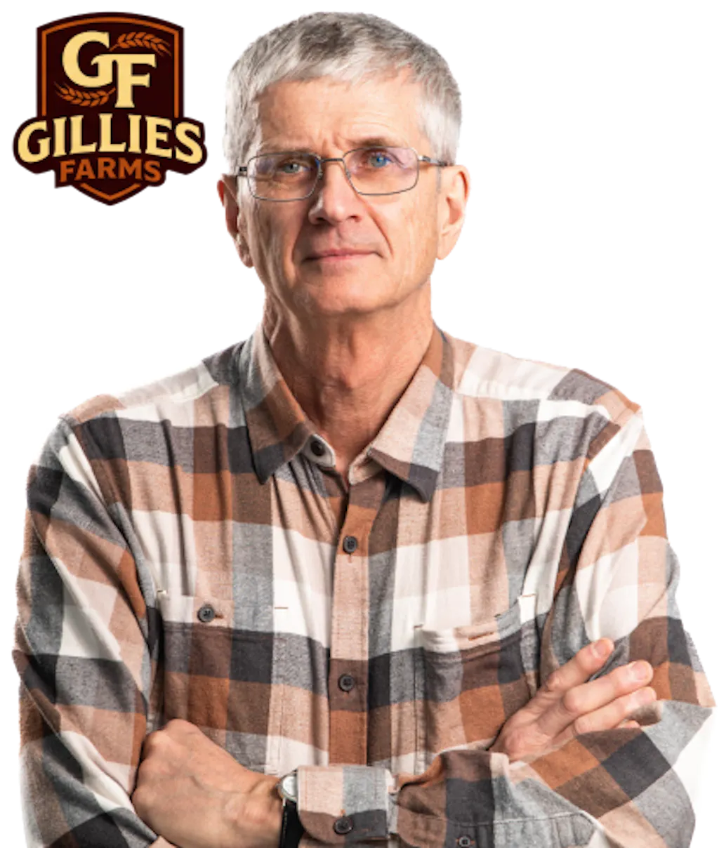 Shield badge with stylized “GF” lettering and a wheat head above, labeled “Gillies Farms” in warm earth tones beside a photo of Bryan Gillies with his arms crossed