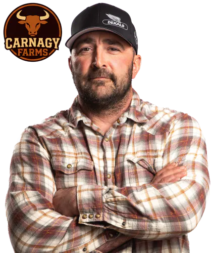 Circular badge featuring a bull head silhouette with the text “Carnagy Farms,” styled in brown and burnt orange beside a photo of Clint Nagy with his arms crossed