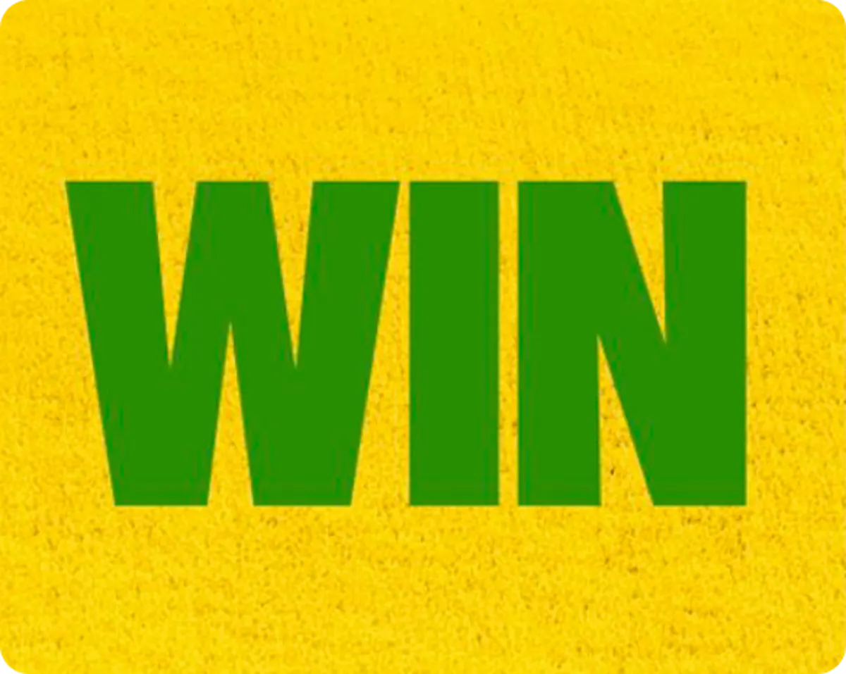 Aerial view of a dense yellow field with large, bold green letters spelling ‘WIN’ prominently across the image.