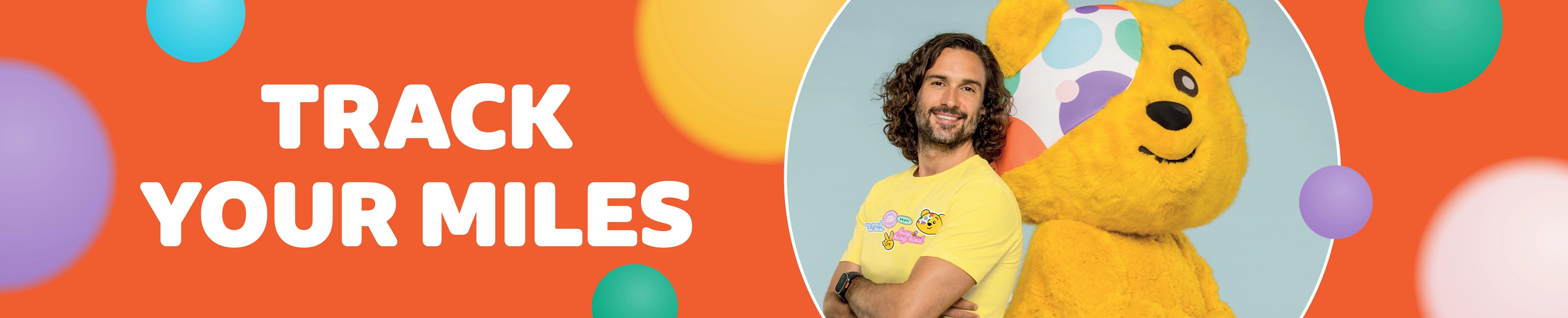 Track your miles site banner with Joe Wicks posing with Pudsey.