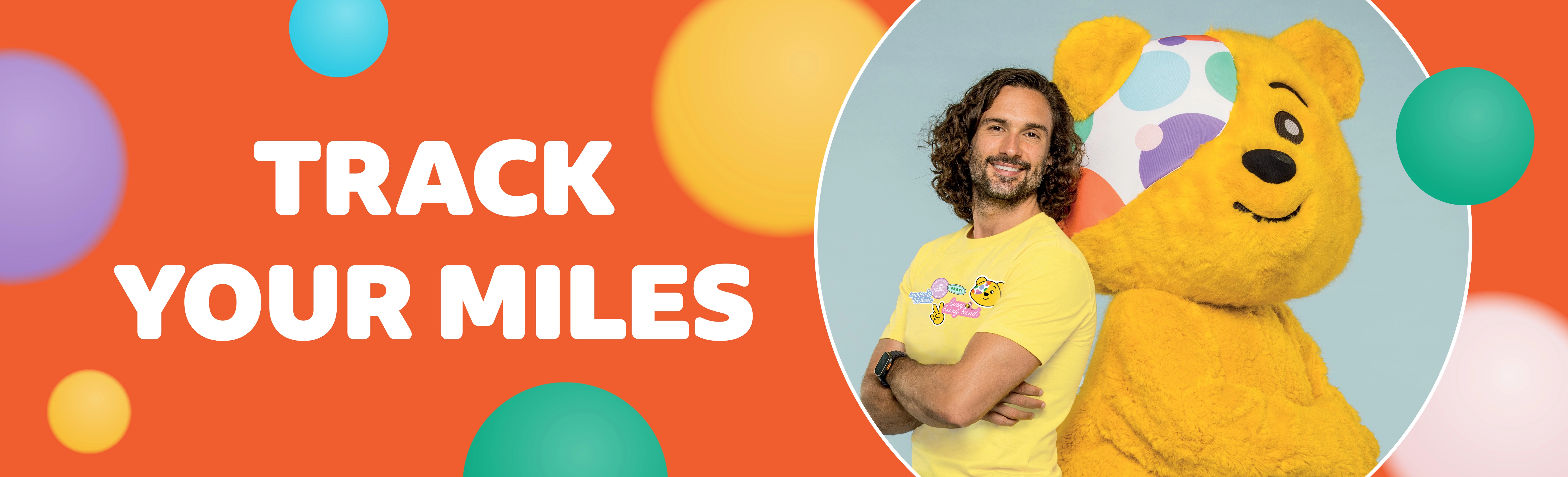 Track your miles site banner with Joe Wicks posing with Pudsey.