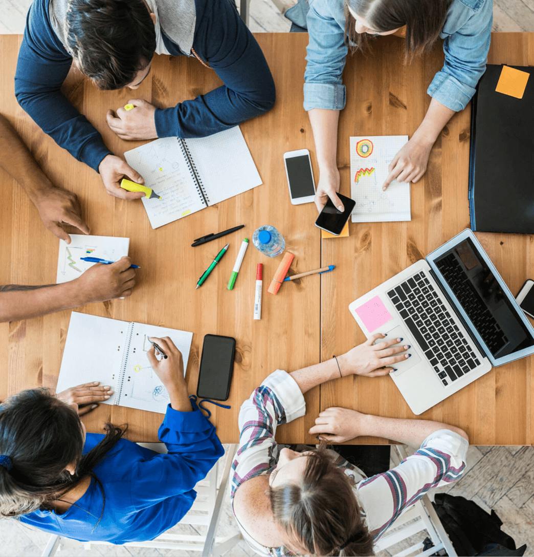 collaborative group working at a conference table