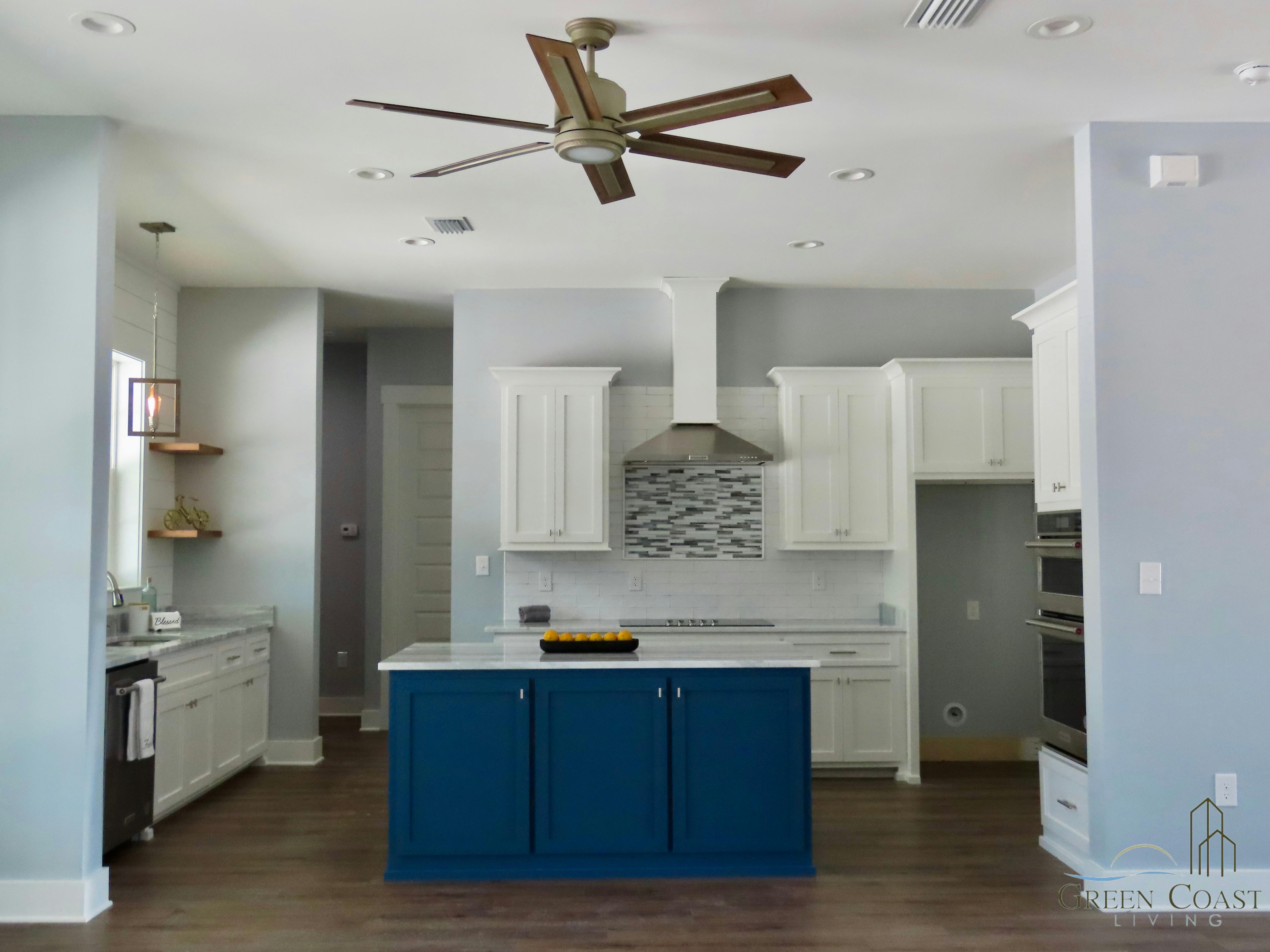Open floor plan coastal kitchen with island