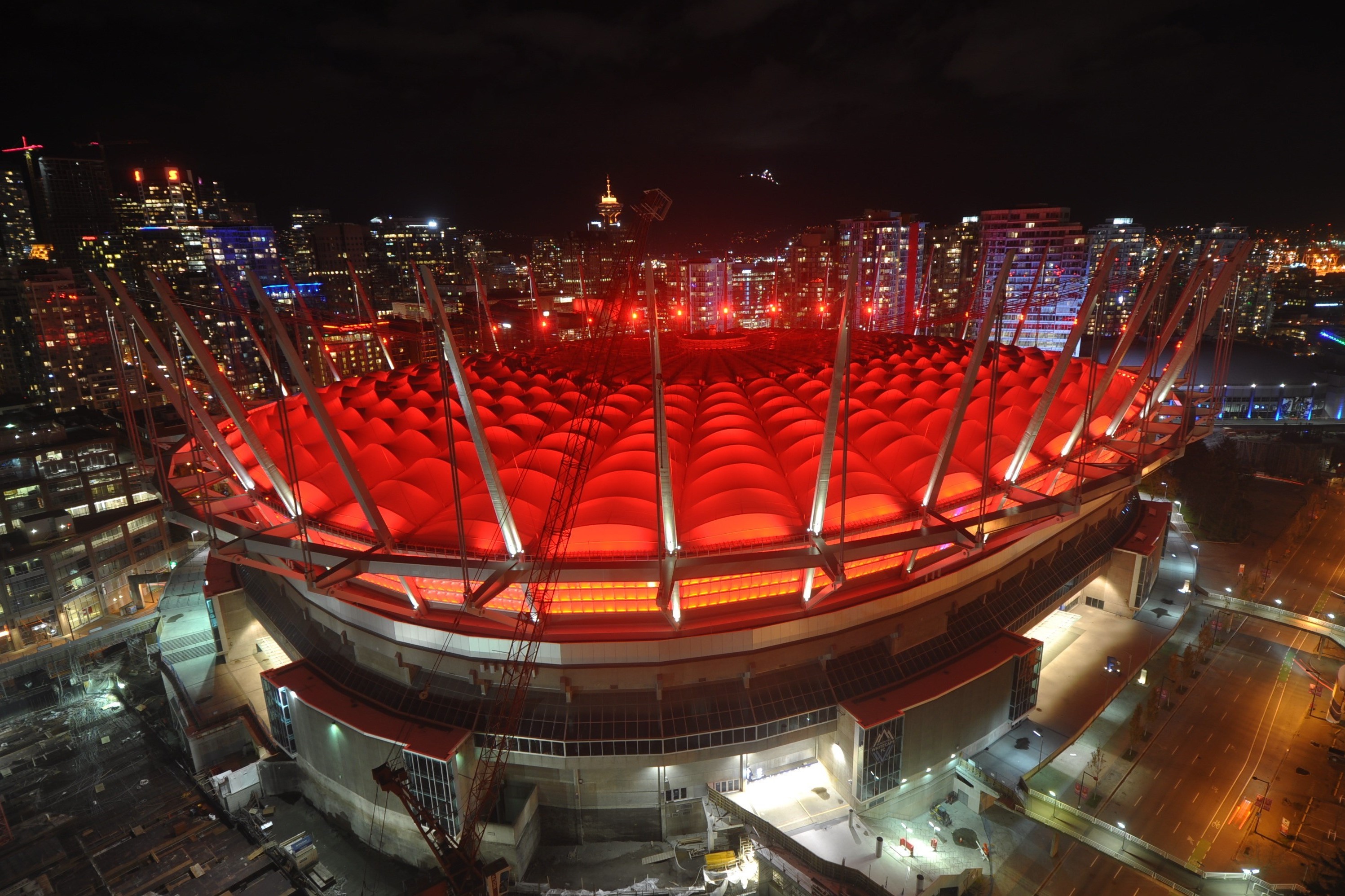BC Place glows red for National Day of Remembrance and Action on