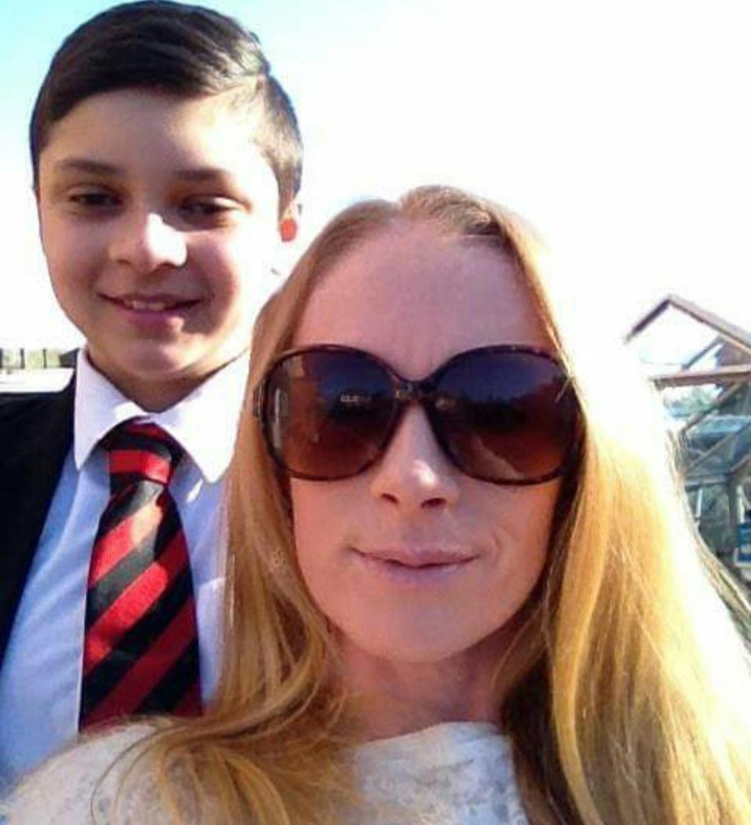 Jodi and Brandon smiling at camera