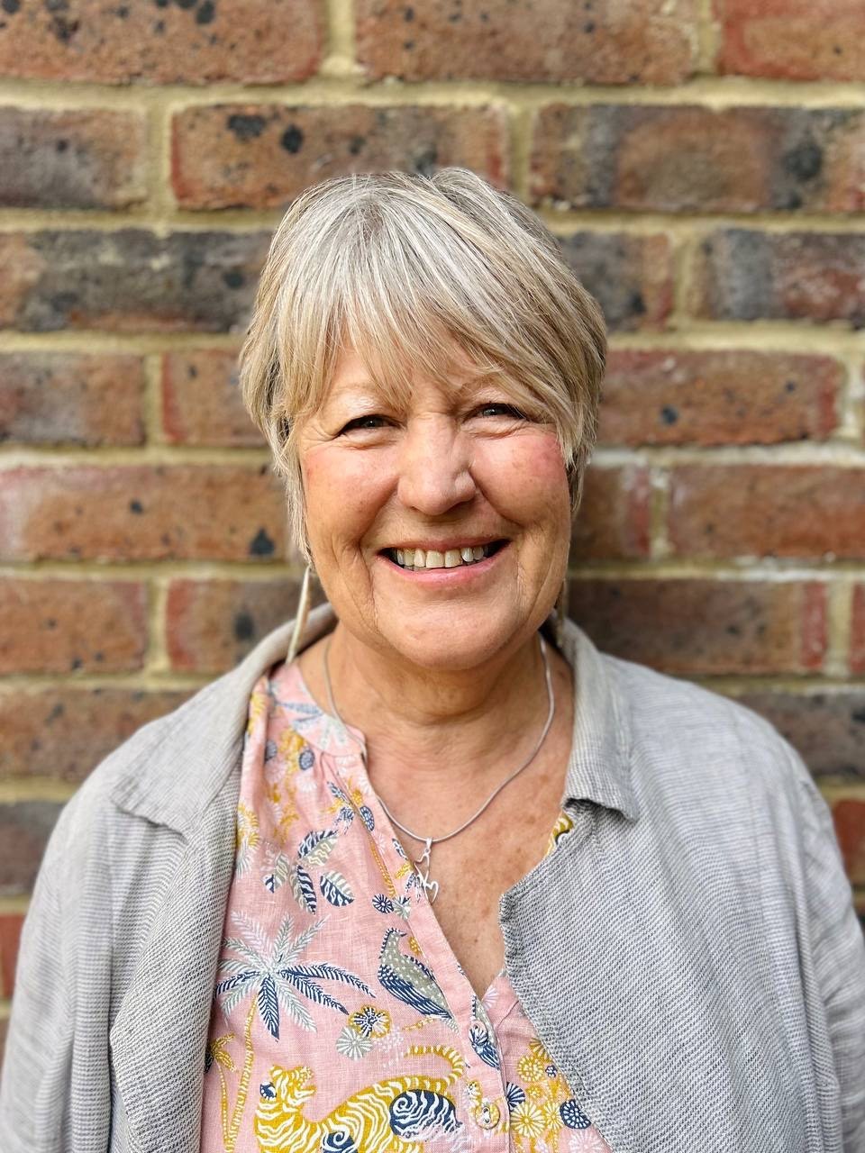 Jo smiling in a profile photo.