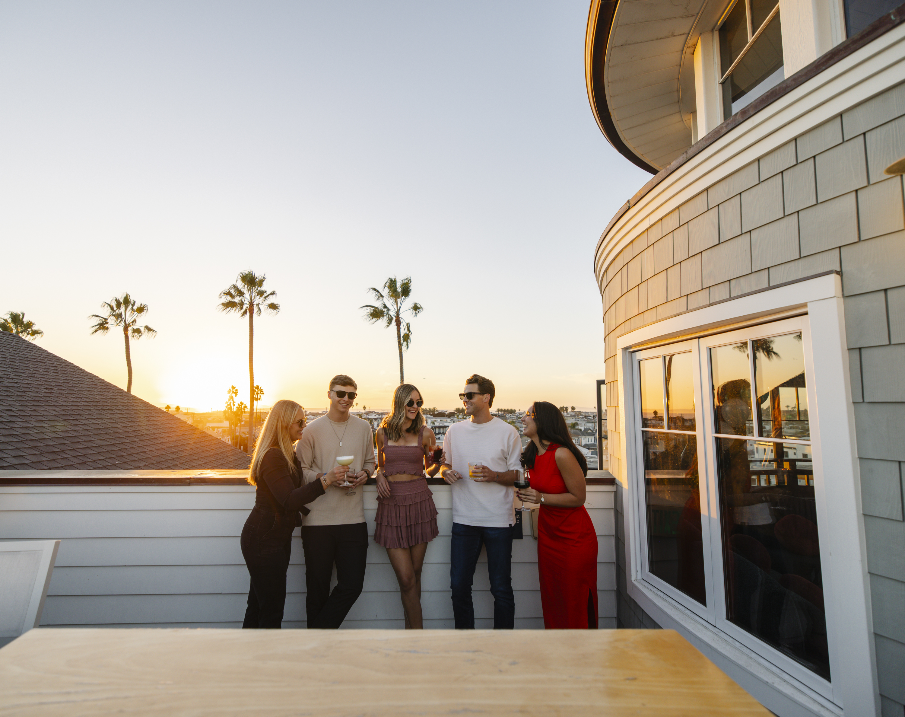 group talking at sunset
