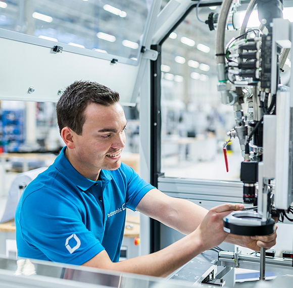 Person who places a component into a machine