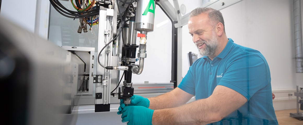 Person working on a dispensing machine
