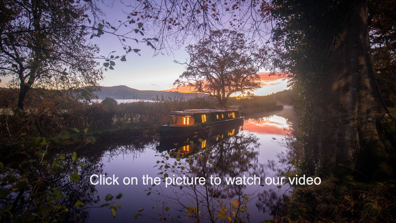 A beacon park canal boat in the early autumn light