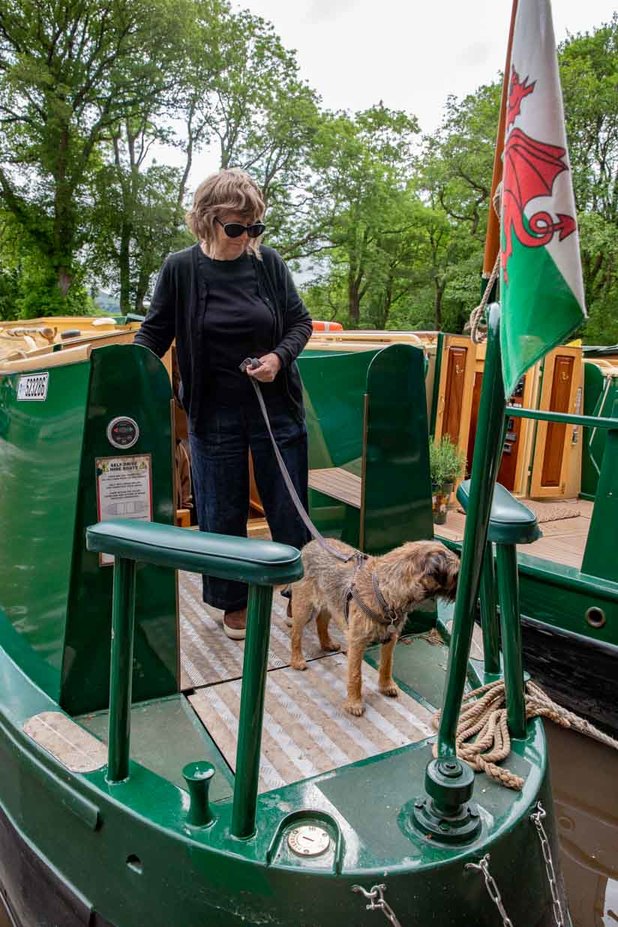 dog with owner aboard a beacon park boat