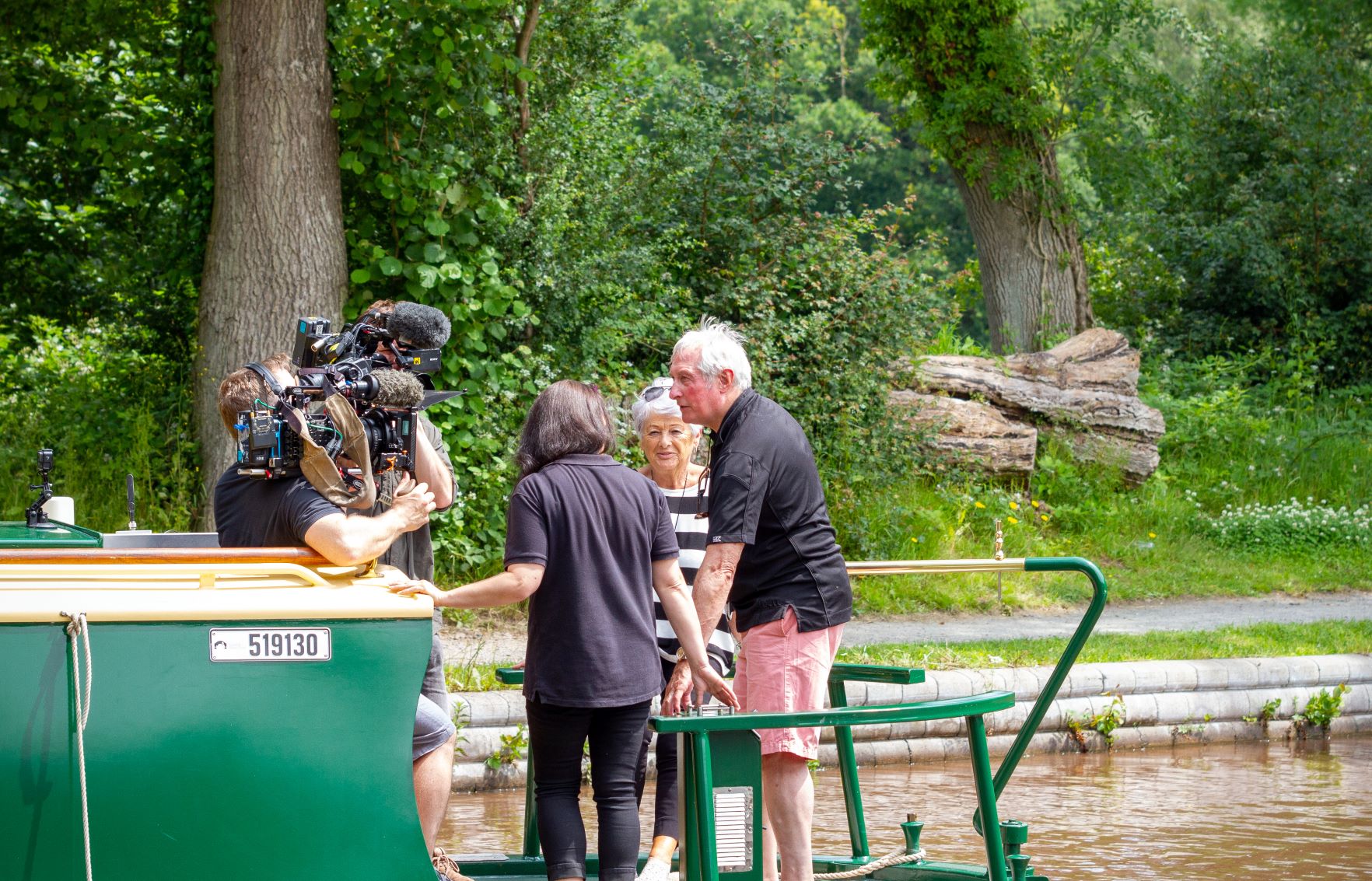 gareth edwards and his wide maureen filming their tv series aboard beacon park boat harrier